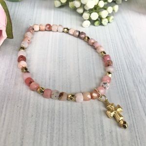 Pink opal beaded bracelet with gold cross charm